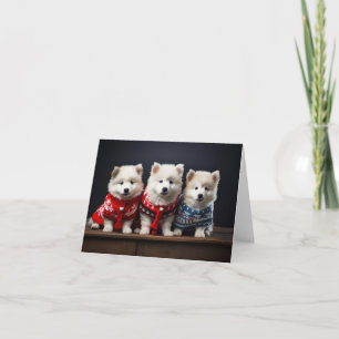 Tarjeta de Navidades de cachorros de Samoyed