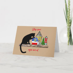 Tarjeta de Navidades de gato en un estante