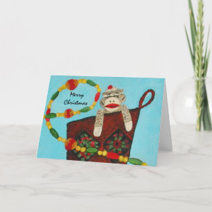 Tarjeta de Navidades de mono de carga