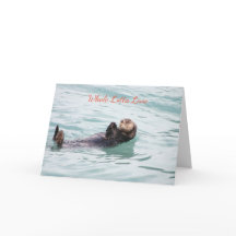 Tarjeta de Navidades de nutrias flotantes completa