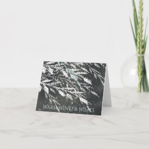 Tarjeta de Navidades de ramas cubiertas de nieve