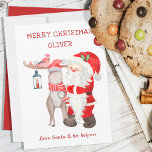 Tarjeta de navidades de Santa y los ayudantes Niño<br><div class="desc">Tarjeta de navidades de Santa - personalizada con el nombre de su hijo. Toda la redacción es editable y actualmente dice "Feliz navidad [nombre] .. amor a Santa y sus ayudantes". El diseño acuático incluye santa,  reno y cardenal.</div>