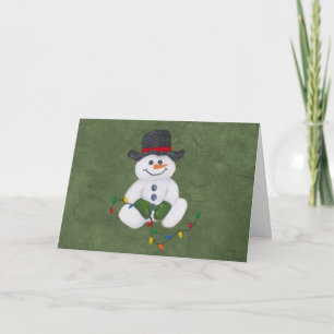 Tarjeta de Navidades de Snowman sentando
