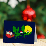 Tarjeta de Navidades divertidos de reno de Dragon<br><div class="desc">Una genial carta de Navidades de fantasía con reno de dragón tirando de Santa Claus en el trineo. Un divertido regalo de vacaciones con dos dragones verdes volando frente a la luna usando sombreros de Santa. La adición perfecta a un regalo para un fanático de fantasía o un niño que...</div>