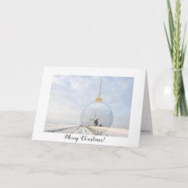 Tarjeta de navidades doblados con bola de vidrio y