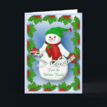 Tarjeta de Navidades Jolly Snowman<br><div class="desc">Un muñeco de nieve helado con bufanda roja y mitones y un gorra verde traerá una sonrisa durante las vacaciones. El borde hueco y el fondo azul añaden alegría navideña a esta tarjeta única de saludo. Añade el nombre de su familia al frente de la tarjeta y se puede cambiar...</div>