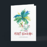 Tarjeta de Navidades Tropical Beach<br><div class="desc">Estas tarjetas de Navidades de playa cuentan con una palmera exótica inspirada en la isla y un bonito Santa de vacaciones. Las palabras "Merry Beach-mas" están escritas a mano. Utilice los campos de plantilla para agregar su saludo personalizado. Una encantadora elección para enviar a amigos y familiares esta temporada de...</div>