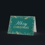 Tarjeta de Navidades Verde azulados Gold Winter Gr<br><div class="desc">Esta elegante tarjeta de Navidad es una excelente manera de enviar un saludo de vacaciones a la familia y amigos. El frente está decorado con una vegetación dorada en un fondo verde azulado oscuro. El texto elegante dice "Feliz Navidad". Agregue su propio mensaje personalizado en el interior o utilice el...</div>