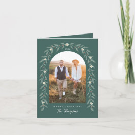 Tarjeta de Navidades verdes con arcos florales de 