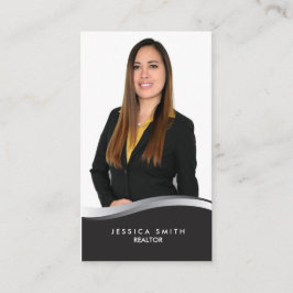 Tarjeta de negocios de swoosh plateado inmobiliari