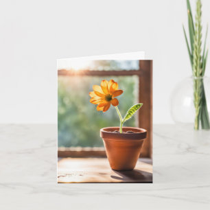 Tarjeta de nota con ventana y margarita naranja