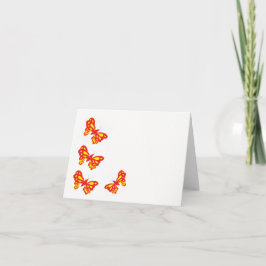 Tarjeta de nota en blanco dentro de las mariposas