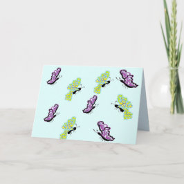 Tarjeta de nota en blanco dentro de mariposas