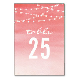Tarjeta de número de mesa con luces de cadena de a