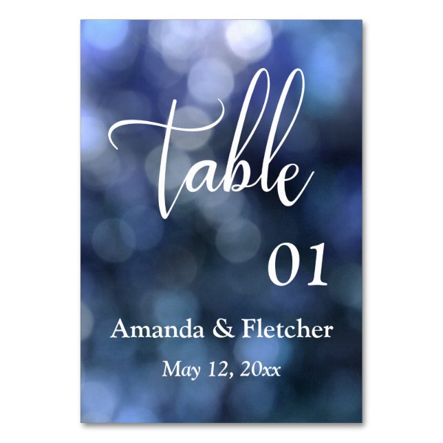 Tarjeta de número de mesa con luz de bokeh azul y  (Anverso)