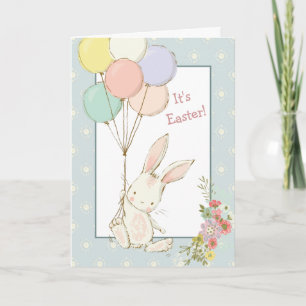 Tarjeta de Pascua de conejito lindo y globos