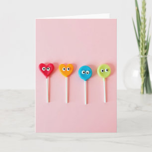 Tarjeta de piruletas con ojos saltones