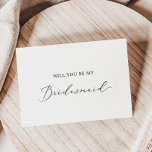 Tarjeta de propuesta de la dama de honor caligrafí<br><div class="desc">Esta delicada tarjeta de presentación de la dama de honor caligráfica es perfecta para un boda moderno. El romántico diseño minimalista presenta una bonita y elegante tipografía negra sobre un fondo blanco con un aspecto limpio y sencillo. Personalizar la tarjeta con el nombre de la novia y la dama de...</div>