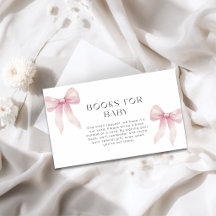 Libro para gemelas en baby shower con lazos rosado