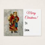 Tarjeta de regalo vintage Christmas Santa<br><div class="desc">Una imagen vintage del clásico santa del mundo antiguo, llevando su famoso abrigo rojo y una bolsa llena de juguetes. Este antiguo Santa Nicolás, también conocido como el viejo San Nicolás, es delgado y tiene un bastón para caminar por la tierra regalando juguetes a todos los chicas y niños. El...</div>