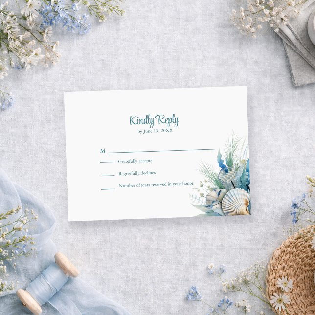 Tarjeta de Respuesta de Boda Boho Azul Floral de P (Boho Blue Floral Beach and Shell Wedding RSVP Card on a romantic table with dusty blue flowers)