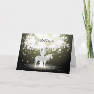 Tarjeta de saludo con árbol fluorescente y unicorn