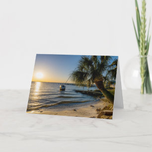 Tarjeta de saludo con arco de palmera inclinado de