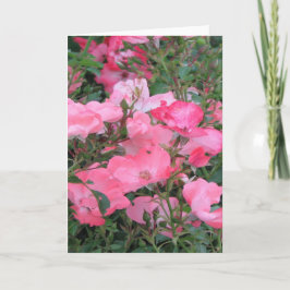 Tarjeta de saludo con rosas rosadas