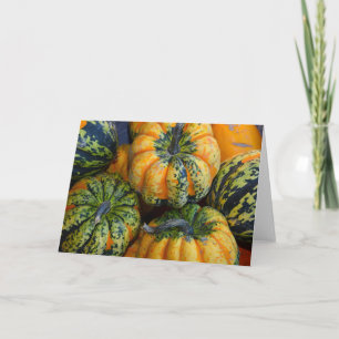Tarjeta de saludo de calabazas verdes y naranjas