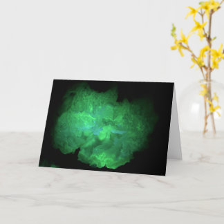 Tarjeta de saludo de Geoda de Trancas bajo luz UV
