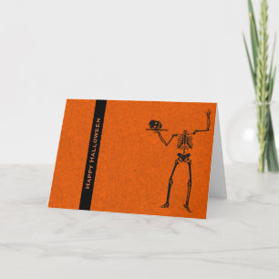 Tarjeta de saludo de Halloween con cráneo mágico