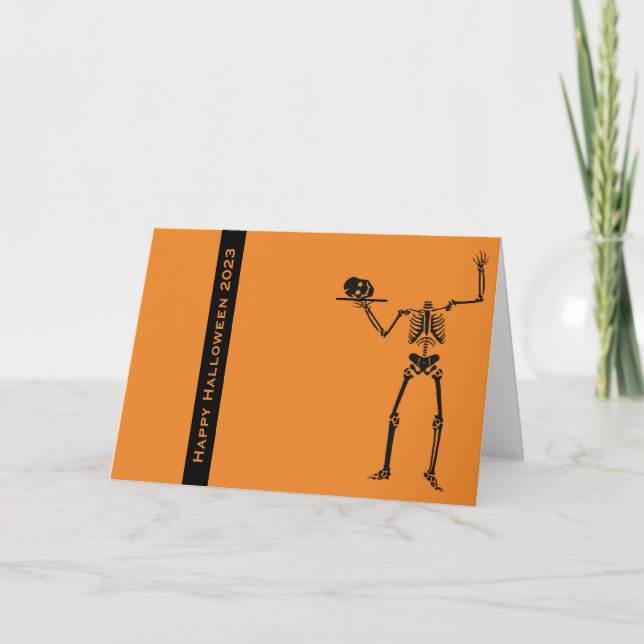 Tarjeta de saludo de Halloween con cráneo mágico (Anverso)