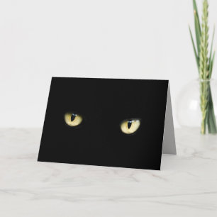 tarjeta de saludo de ojos de gato negro