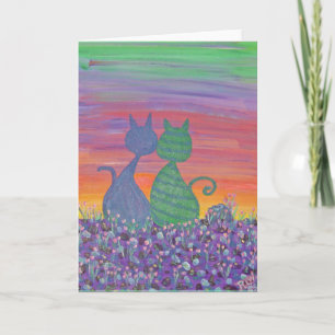 Tarjeta de saludo-Dos gatitos en los tulipanes