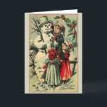 Tarjeta de saludo para Navidades de Snowman de Vic<br><div class="desc">Tarjeta de saludo de Navidades Vintage/Victorianos. ¡Tres niños adorables que dan un toque final a su maravilloso muñeco de nieve! ¡Una Feliz Navidad!</div>