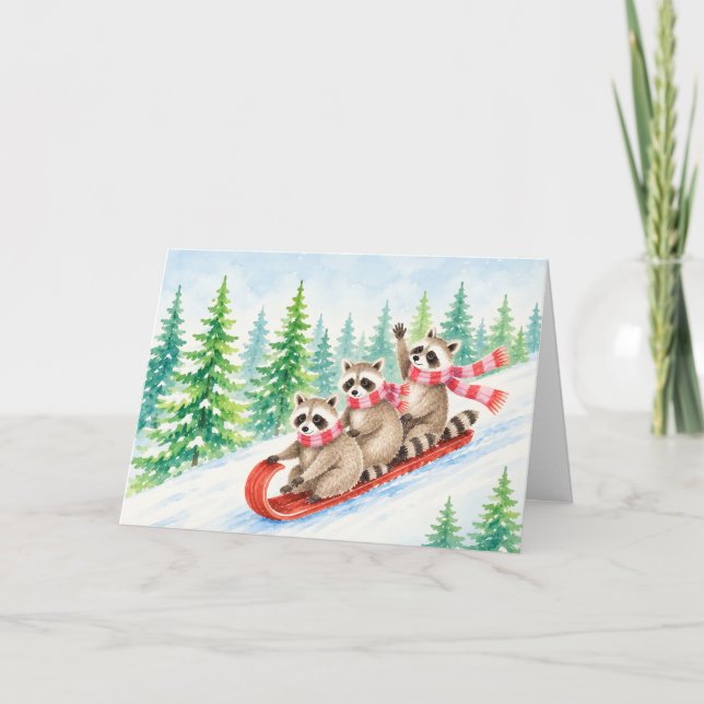 Tarjeta de vacaciones de invierno con mapaches en  (Anverso)