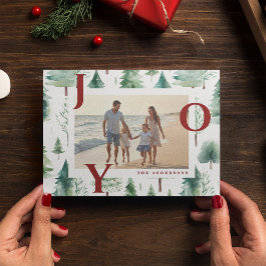 Tarjeta de vacaciones de Navidad con árboles de al