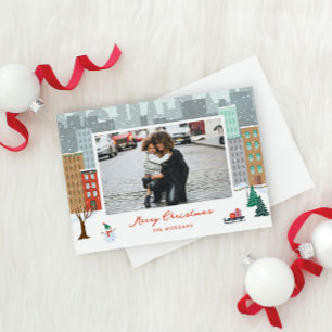 Tarjeta de vacaciones plana de Navidad en la ciuda