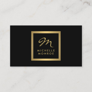 Tarjeta de visita atractiva del monograma del oro