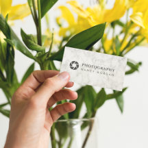 Cámara fotográfica lente mármol blanco