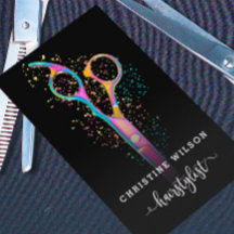 coloridas tijeras de peluquero sobre negro