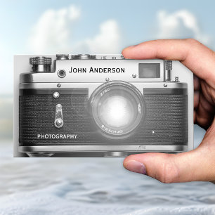 Tarjeta de visita de fotógrafo con cámara en blanc