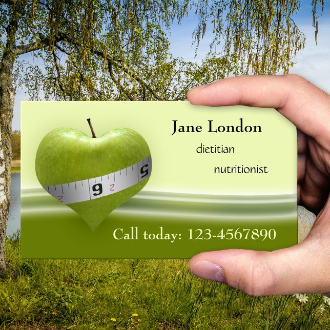 Tarjeta de visita dietista nutricionista Green Hea (Business card for a nutritionist or dietitian showing an apple in heart shape with a measuring tape)