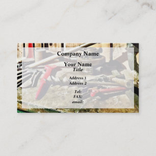 Tarjeta De Visita Dos llaves rojas en el banco de trabajo del fontan