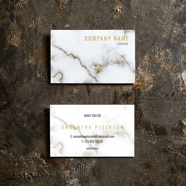 Tarjeta De Visita Efecto mármol dorado (White marble business card with gold veining, bold name, and minimalist black details.)