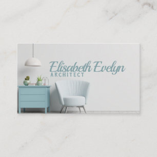 Tarjeta De Visita En el interior hay un sillón sobre una pared blan