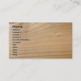 Tarjeta de visita en la madera inacabada
