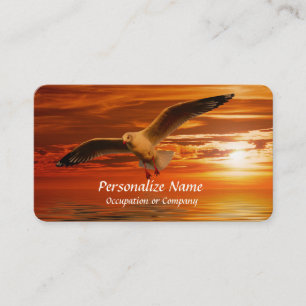 Tarjeta De Visita Gaviota viajando volando sobre el océano al atard