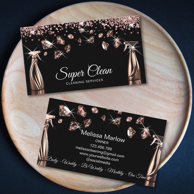 Tarjeta De Visita Limpieza profesional de casas (two rose gold house cleaning spray bottles spraying diamonds, black background, luxury feel)