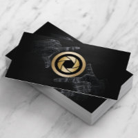 Logotipo de obturador de oro elegante madera oscur